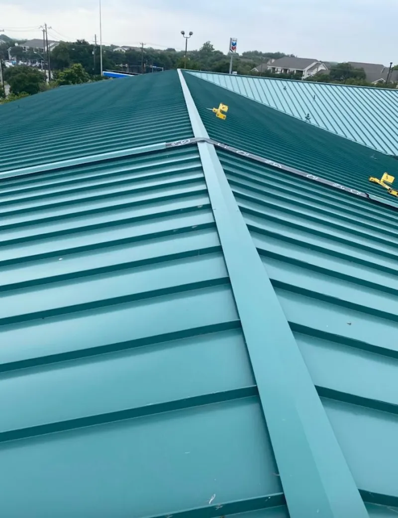 Green commercial metal roof ridge and valley for Metal Roof Repair in Black Forest